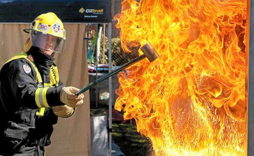 Woolgoolga Fire Station deputy captain Drew Armitage demonstrates how quickly a kitchen fire can escalate. Woolgoolga Fire Station deputy captain Drew Armitage demonstrates how quickly a kitchen fire can escalate.